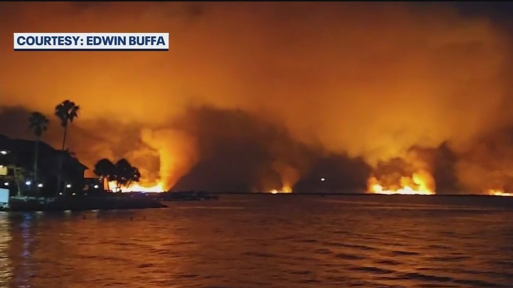 Brush fire still burning more than 24 hours later in Titusville